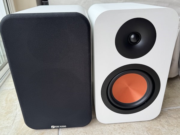 One grill on, one off — if Q Acoustics had an affair with Klipsch