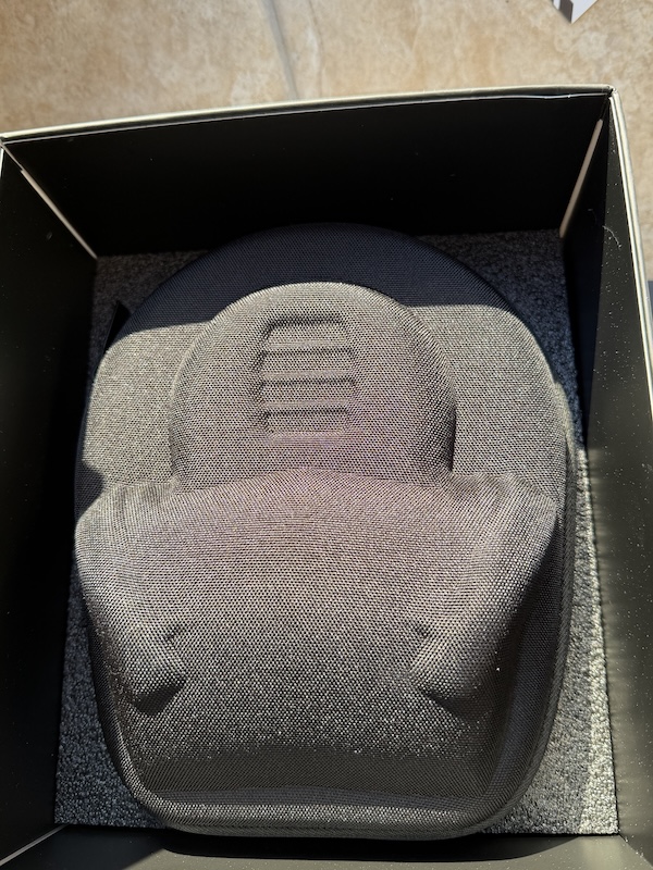 the sculpted carry case nestled in the box