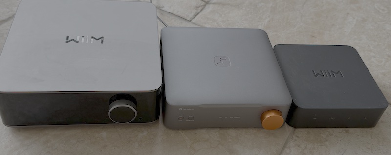 the WiiM Ultra and Pro either side of the Fosi Audio S3