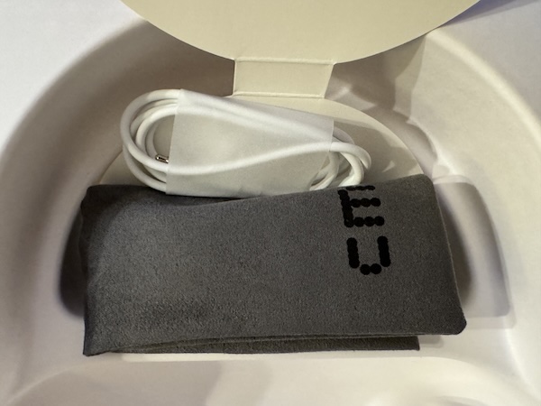 Cable and cloth bag inside compartment