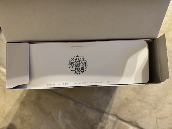 Opening box - app QR code visible