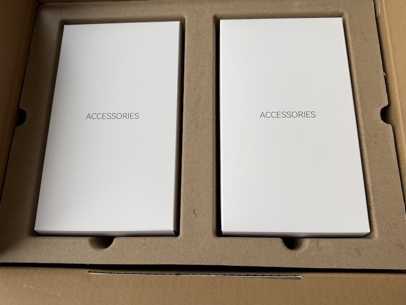 open box with accessory boxes visible