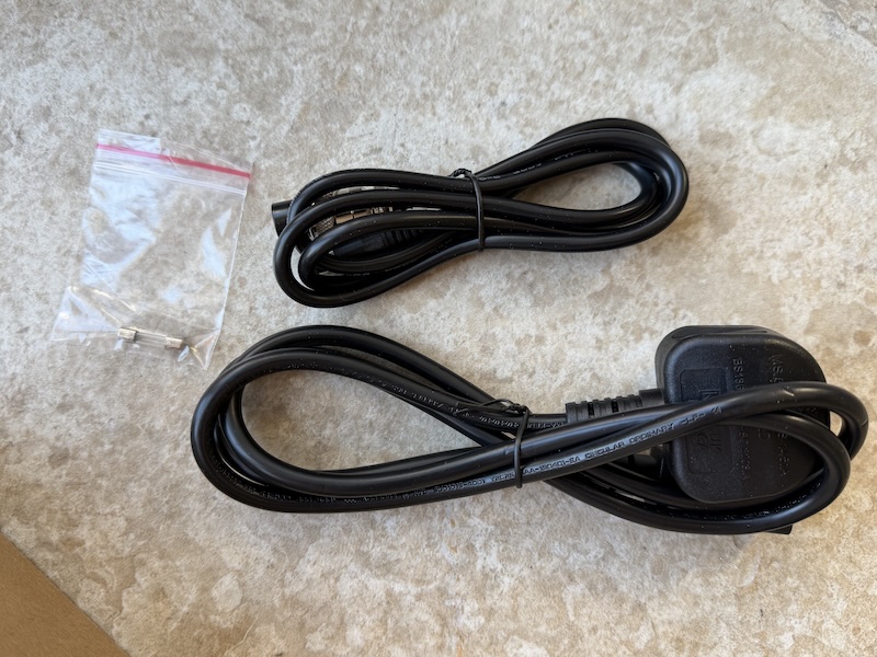 power lead plug and spare fuse included in the accessories