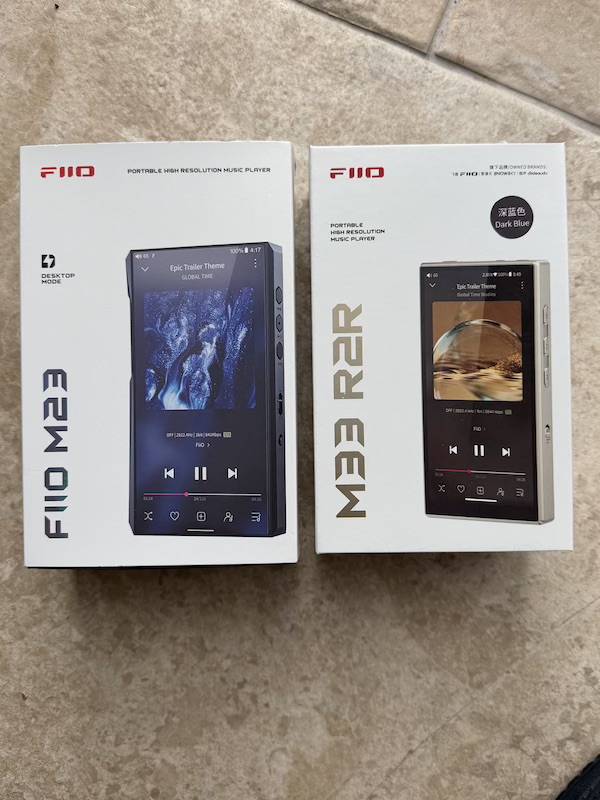 m33 r2r box alongside the m23 box — a noticeably slimmer package