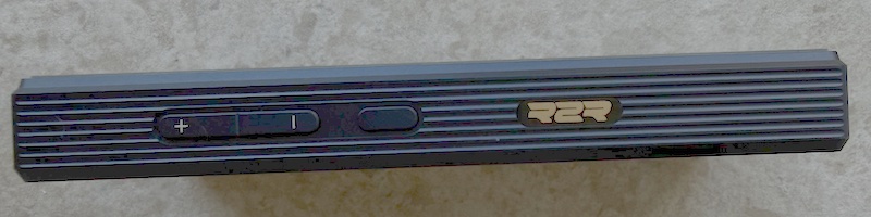 side buttons — right panel with play/pause and track navigation