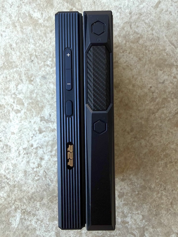 side comparison with the m23 — the m33 is noticeably slimmer