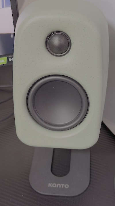 Green model on stand in e-earphone store Tokyo