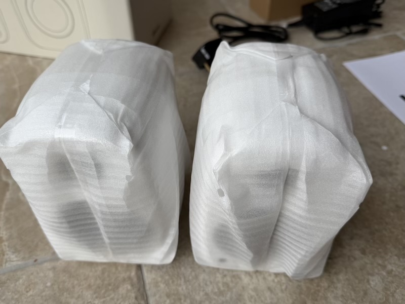 Speakers still in individual protective covers