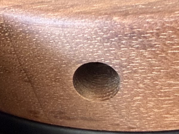 connector positioned on the walnut earcup