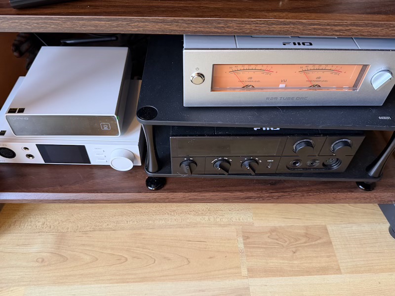 E50 II alongside the FiiO Warmer R2R — a study in contrasting design philosophies