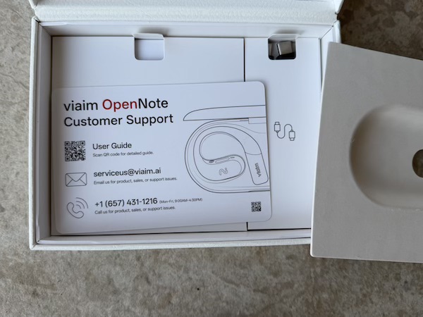 underneath layer showing accessories and customer support note