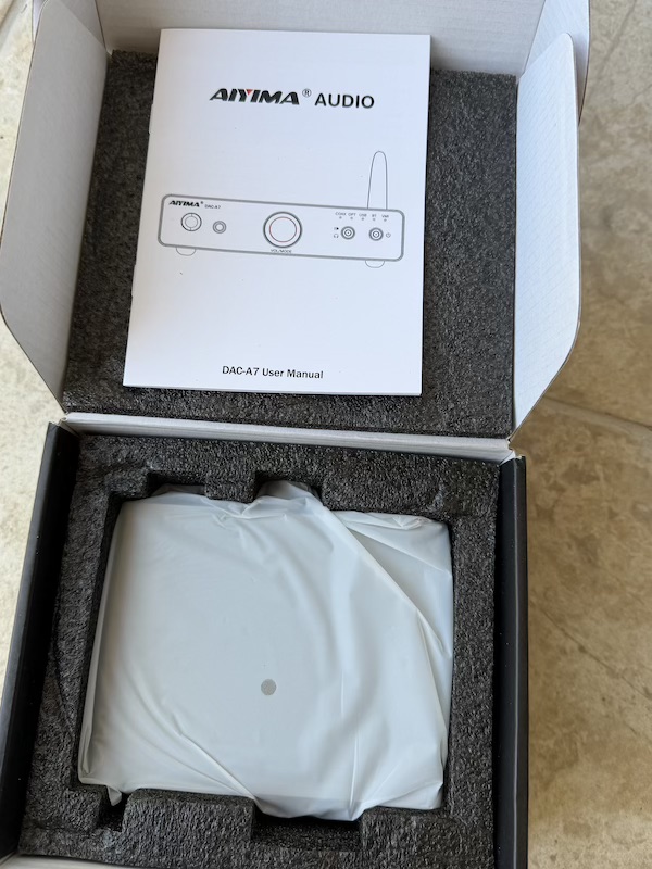 open box with manual and DAC-A7 visible