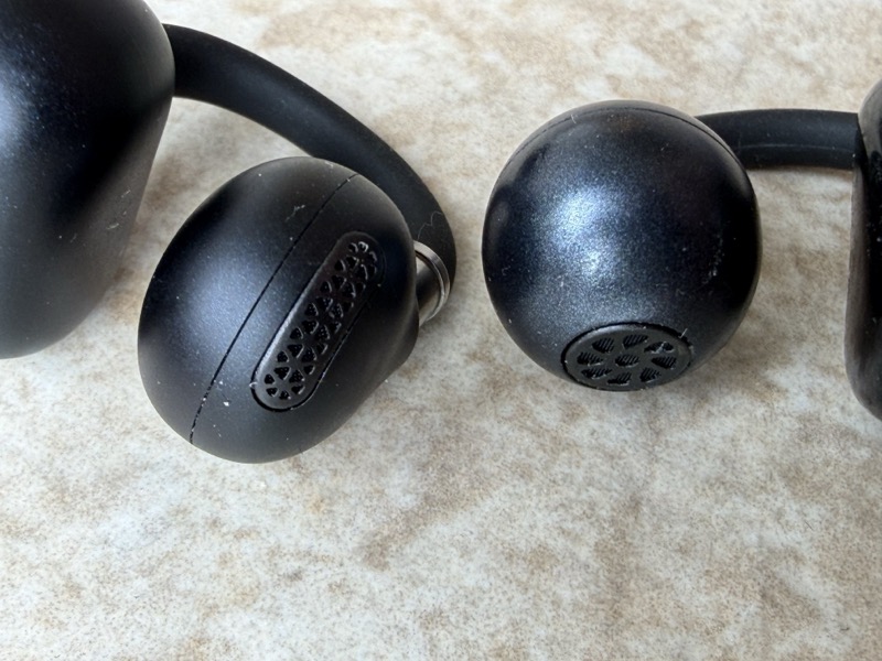 back of earbud showing connections and mesh