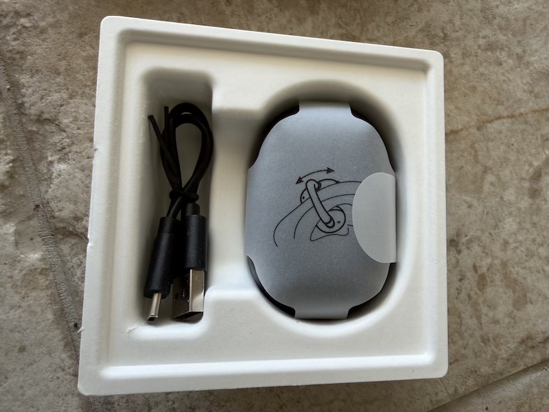 open box with case and accessories visible