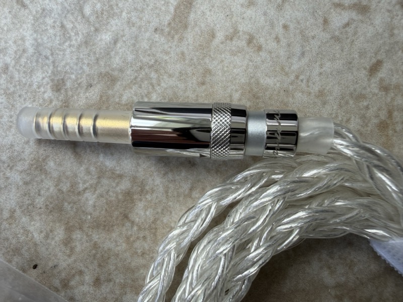 cable attached at headphone connector