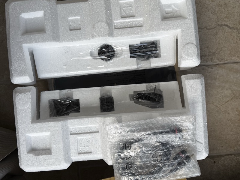 accessories tray — cartridge, counterweight, tonearm parts