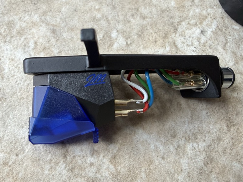 MM cartridge with blue stylus on the headshell