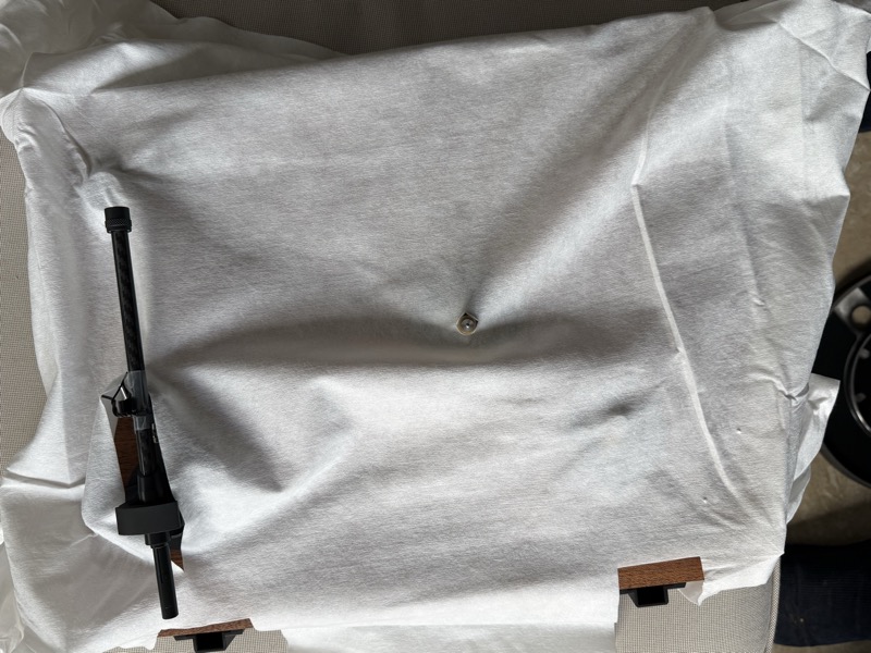 unwrapping the turntable body and tonearm