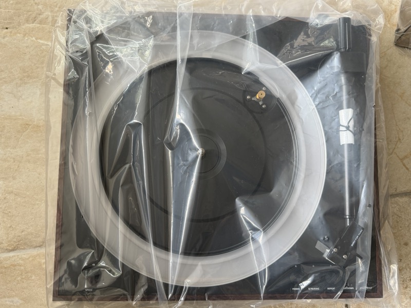 plinth and tonearm in protective packaging