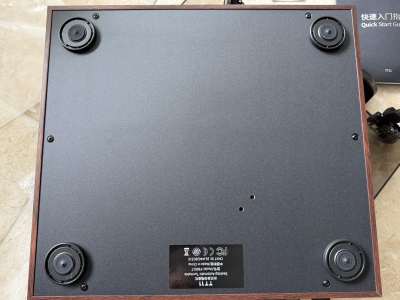 underside showing the feet and model label
