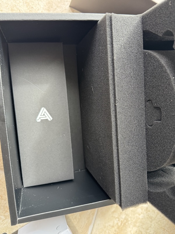 the accessory tray sitting under the headphone
