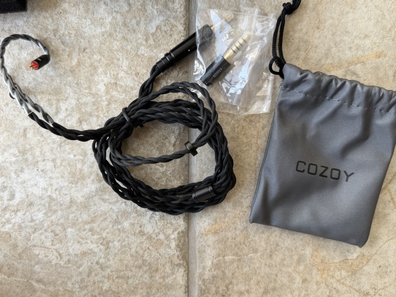 box contents cable and 4.4mm adapter and soft carrybag