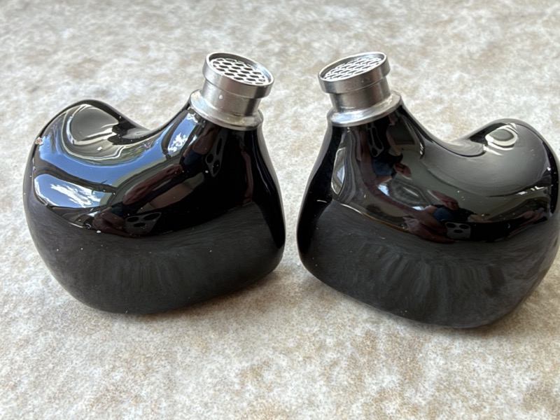 nice iem opinionated pair of glossy black iems