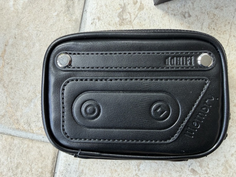 the case front, with the “Memory” logo embossed into the leather