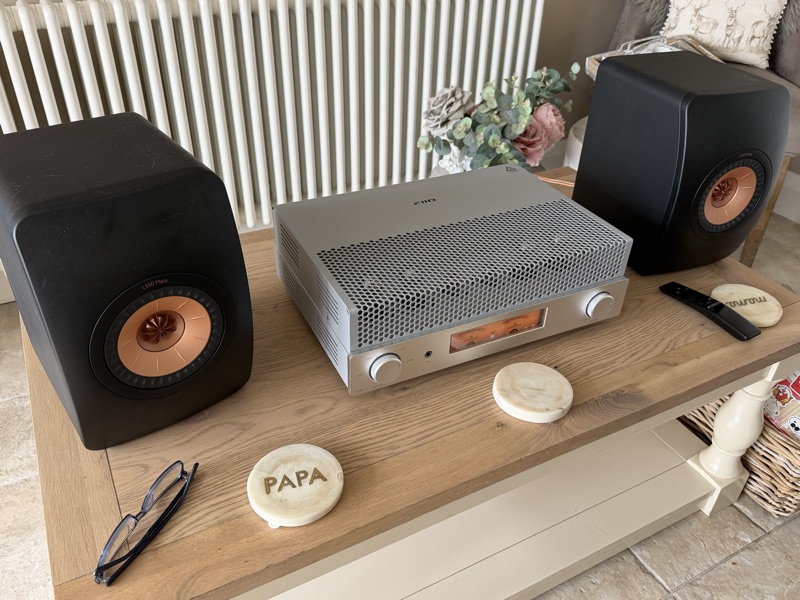 on table with kef ls50 metas