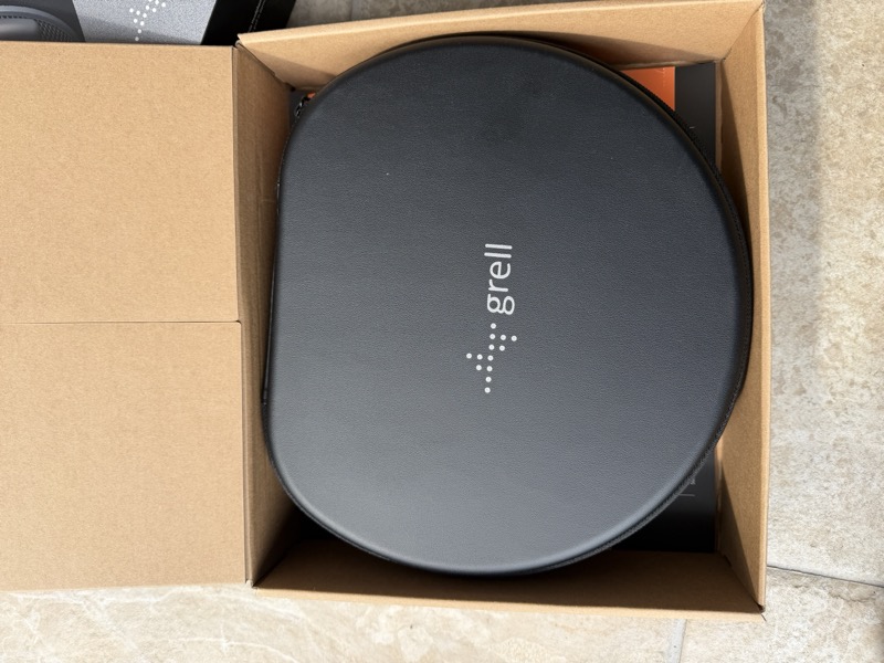 the slim, flat carrying case nested in the box
