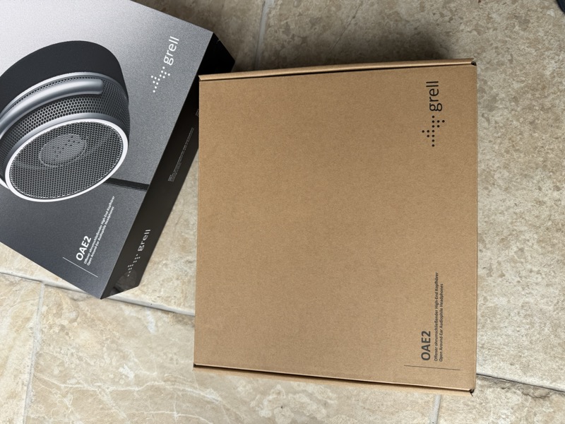 the retail box and the plainer kraft shipping box underneath