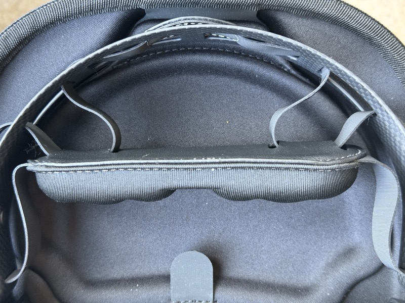 the case interior, empty, showing the moulded headphone recess