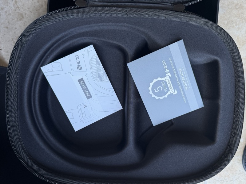 the carrying case with the warranty booklet and manual