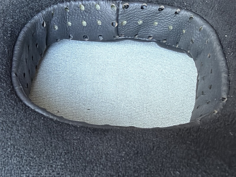 the leather earpad, showing the perforated leather rim