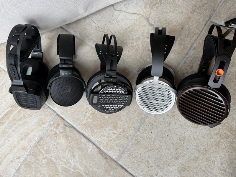 several of the same headphones lined up beside the TWO GT