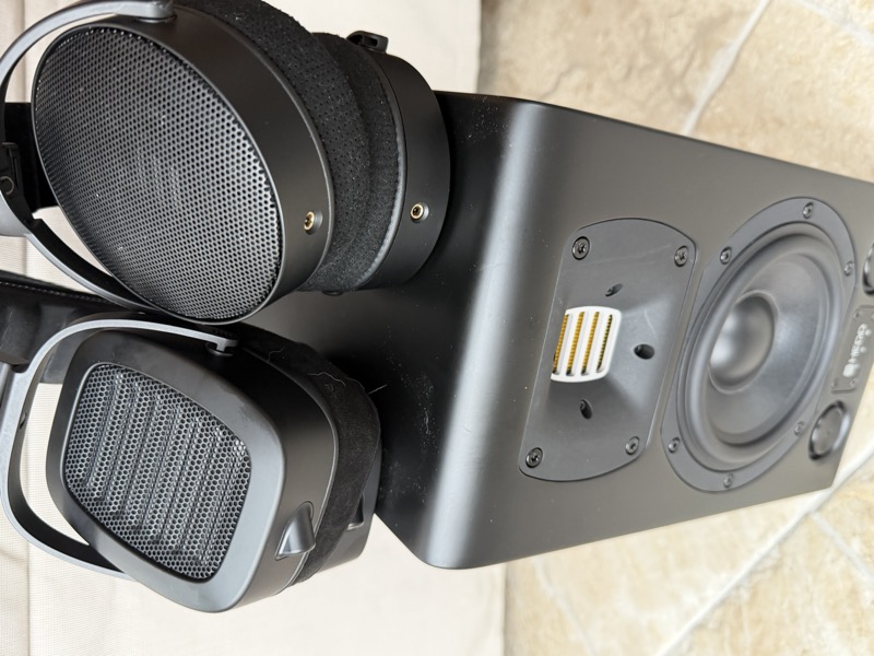 the D1 and TWO GT sitting on top of a HEDD studio monitor, its AMT tweeter visible