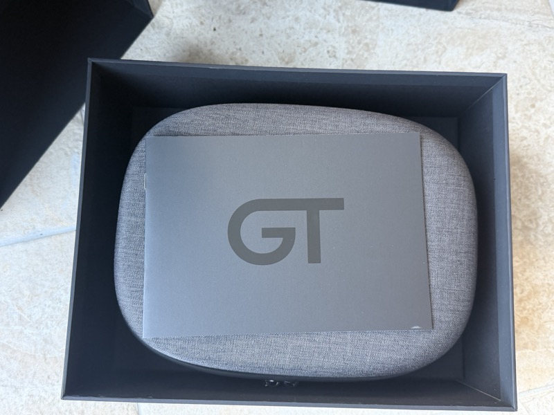 the headphone’s own compartment, with the carrying case and a GT-branded card