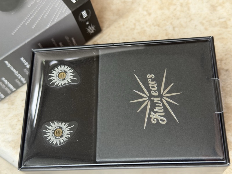 inner tray with IEMs and folder