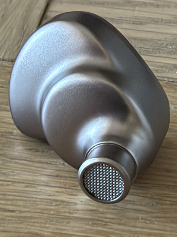 angled closeup of a single Halcyon shell showing the nozzle mesh