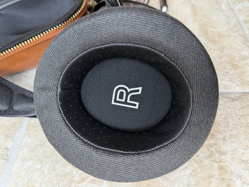 the earpad alongside the leather carrying case
