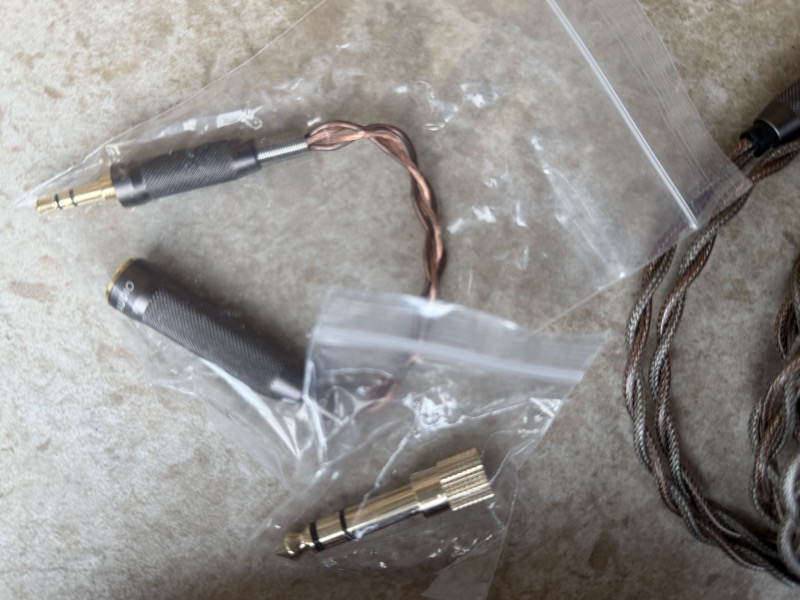 the two adapters, individually bagged