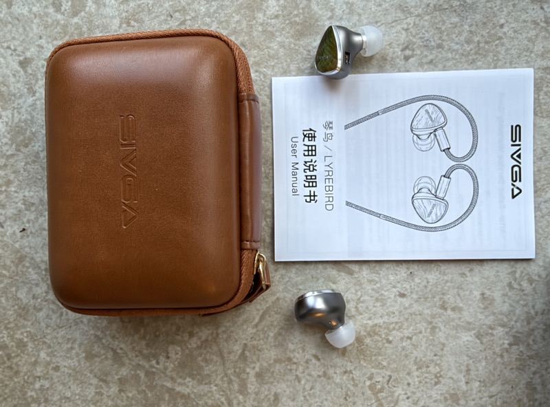 the manual and the leather carrying case
