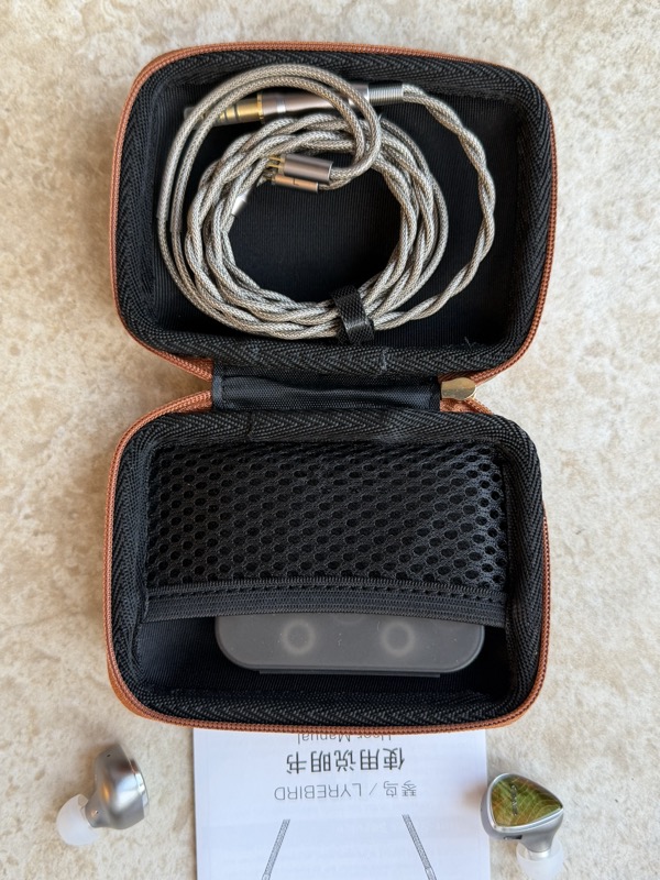 the carrying case open with the cable inside