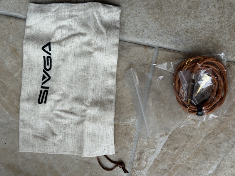 the cable and adapter, with the hemp storage bag