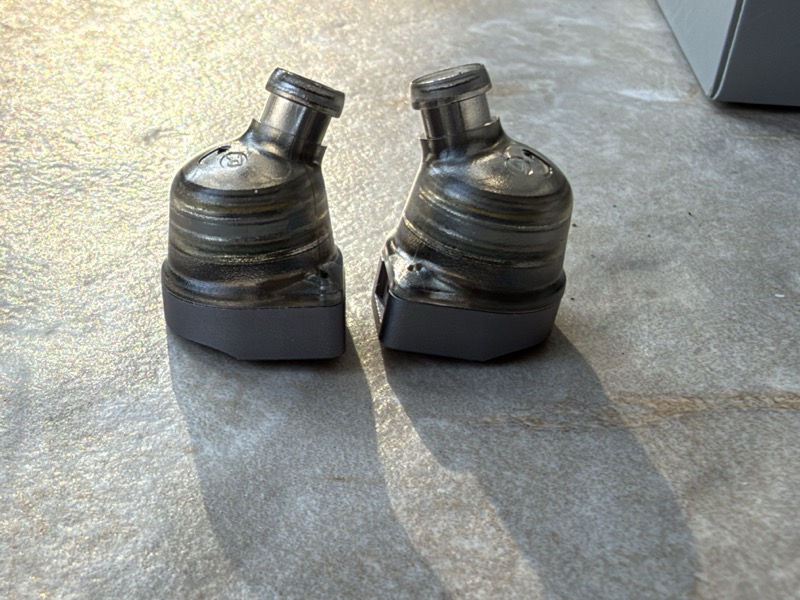 both shells side by side showing the rounded housing shape