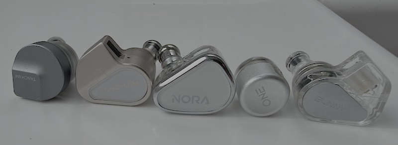 the tanchjim ola ii alongside other tanchjim iems including the nora, one and bunny