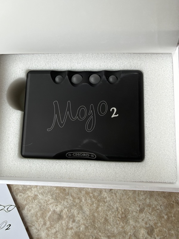 chord mojo 2 in its foam tray showing the top face and control spheres