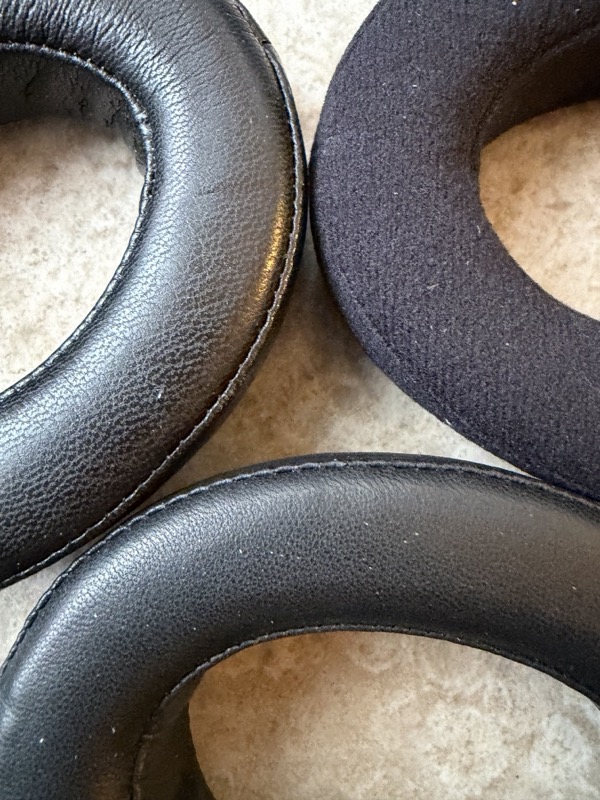 close-up comparing dekoni leather and velour pad surfaces alongside each other