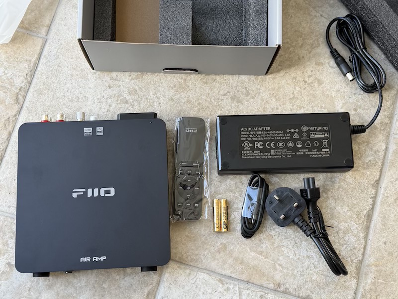 full box contents: amplifier, remote, batteries, psu and mains lead