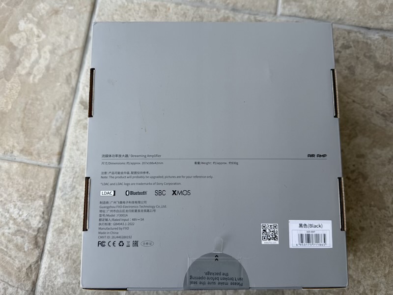 rear of the retail box showing dimensions, weight and codec logos